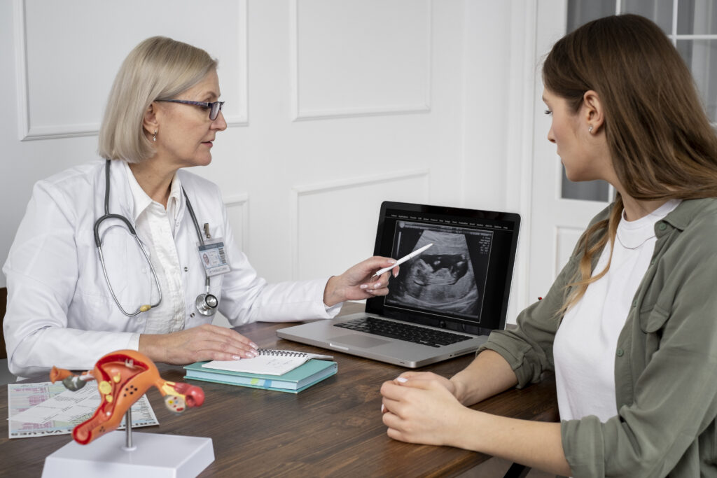 ob-gyn doctor explaining ultrasound